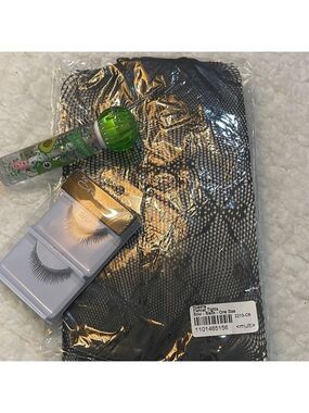 The Creme Shop Eyelashes Set fishnet hose and lip gloss